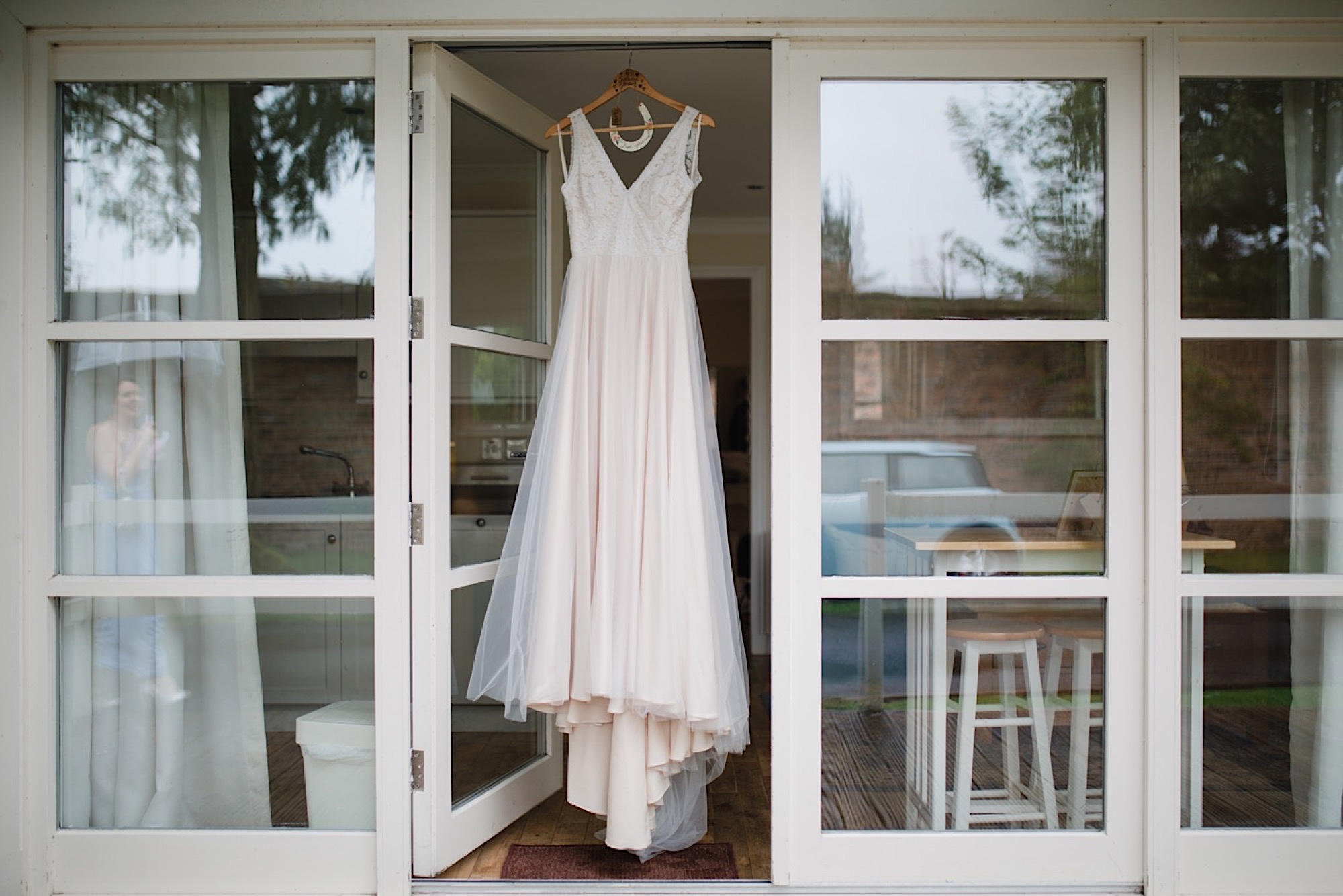 wedding dress hanging outside at the cruin loch lomand