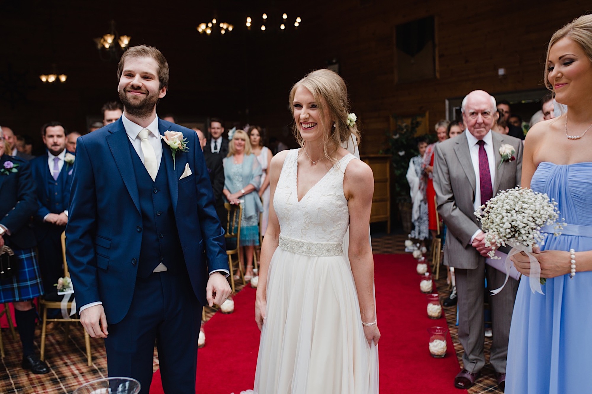 bride and groom exchanging wedding rings