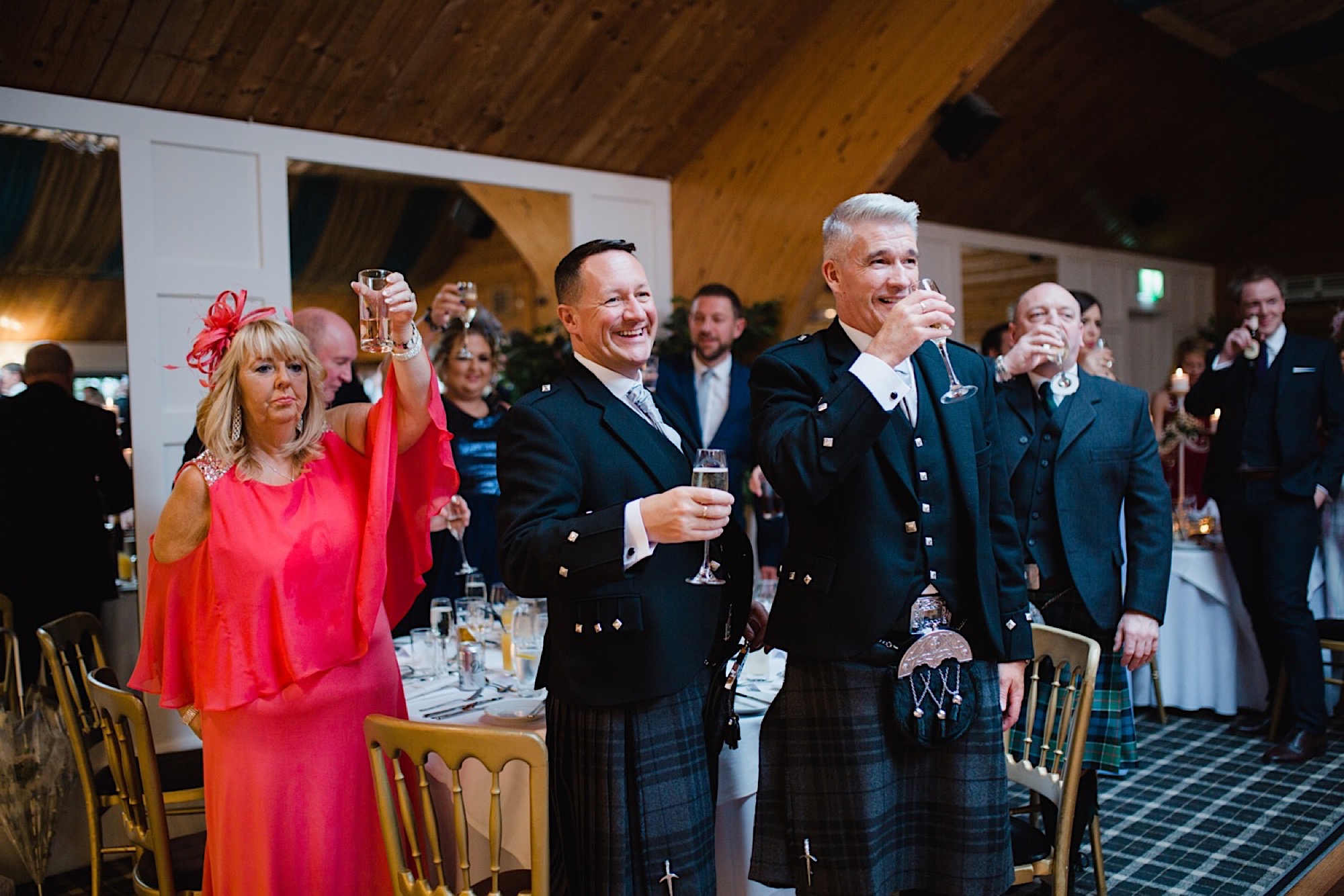 guests toasting the bride and groom